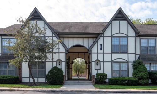 the exterior of a home with a lawn