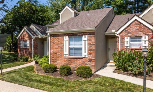 the exterior of a home with a lawn